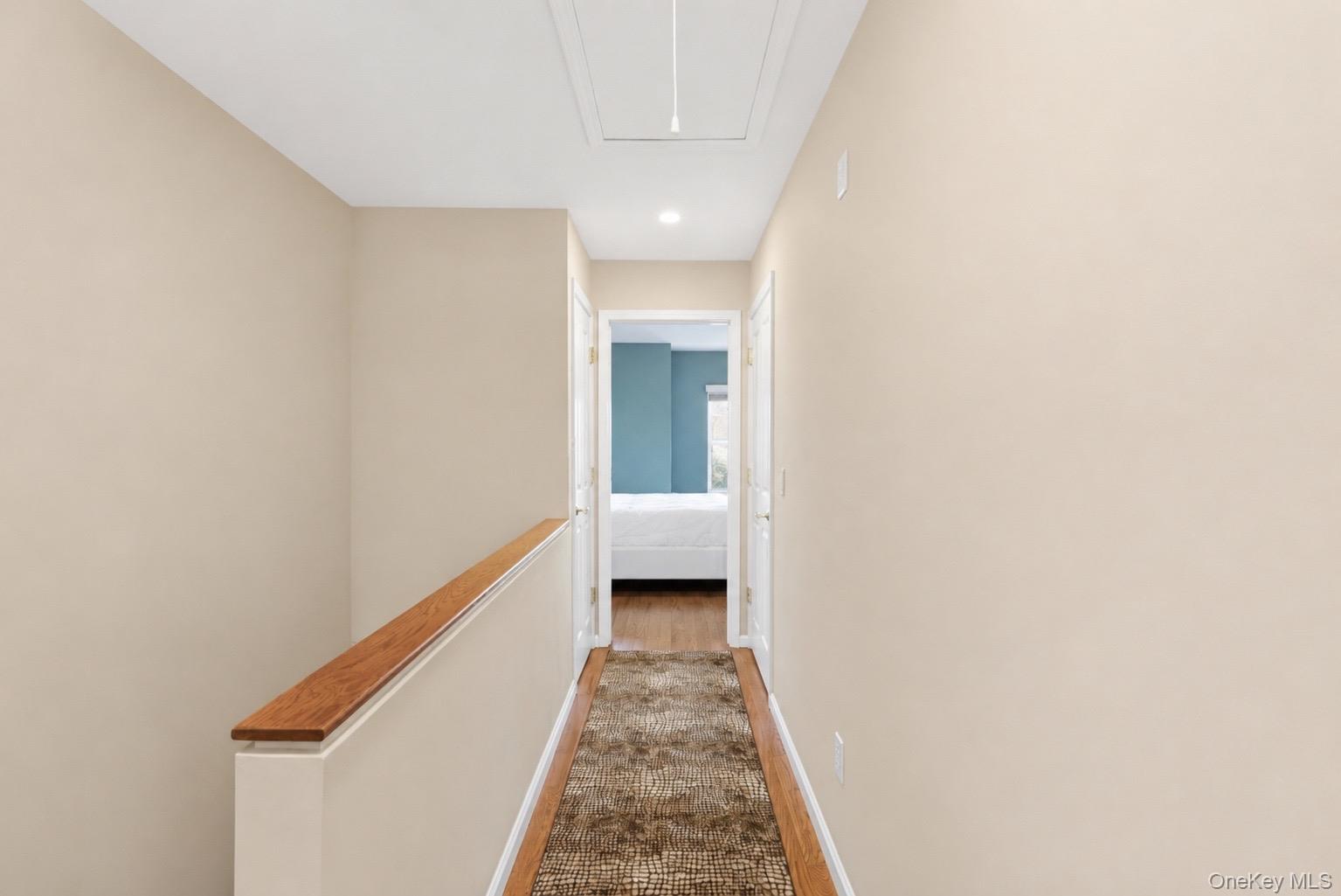 323 Waterside Close Peekskill, NY 10566 - Photo 19 of 42 Hallway between bedrooms has laundry closet and linen closet. New recessed light can now also be operated by a switch at the bottom of the stairs.
