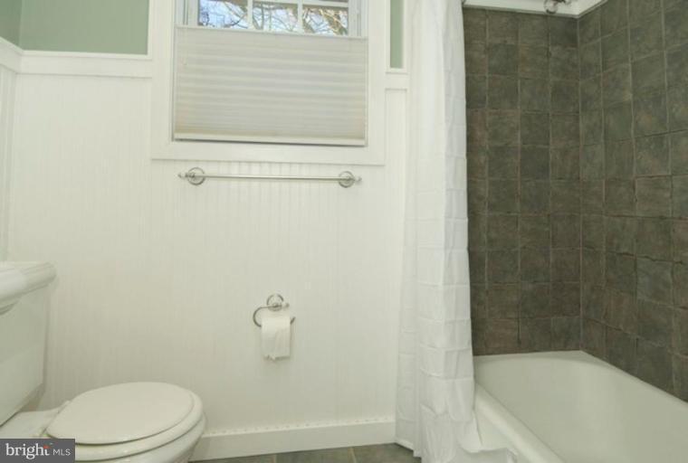 6804 Front Royal Road Springfield, VA 22151 - Photo 20 of 27 a bathroom with a toilet and shower