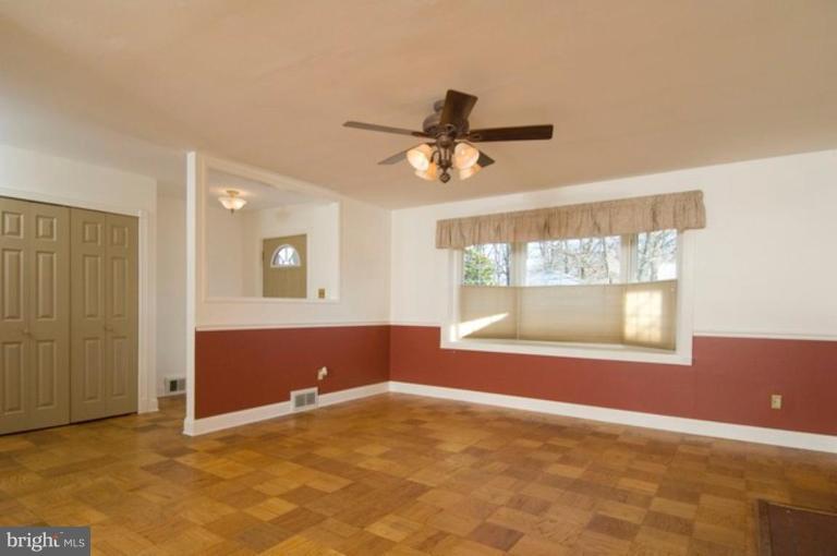 6804 Front Royal Road Springfield, VA 22151 - Photo 7 of 27 a view of an empty room with a window