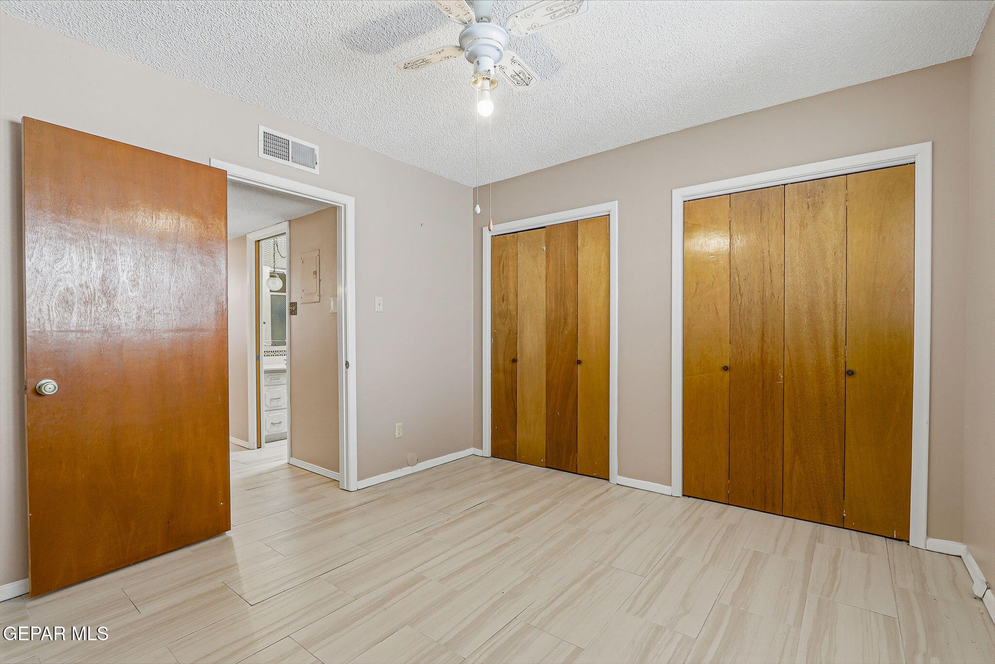 520 Cardon Street El Paso, TX 79903 - Photo 27 of 42 a view of entryway with wooden floor