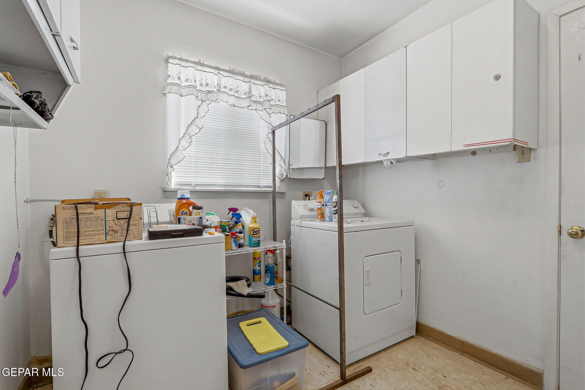520 Cardon Street El Paso, TX 79903 - Photo 28 of 42 a room with storage and utility
