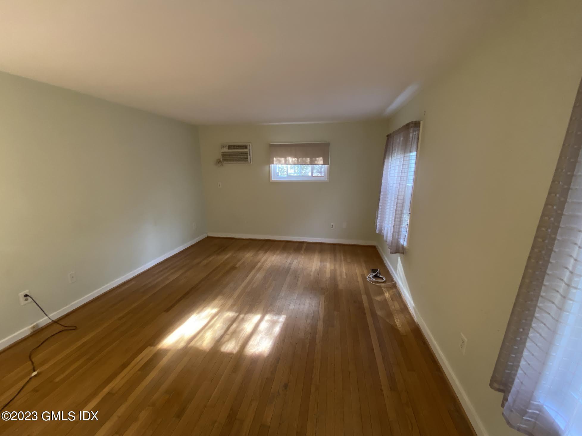 21 Hycliff Road Greenwich, CT 06831 - Photo 12 of 13 a view of empty room with wooden floor