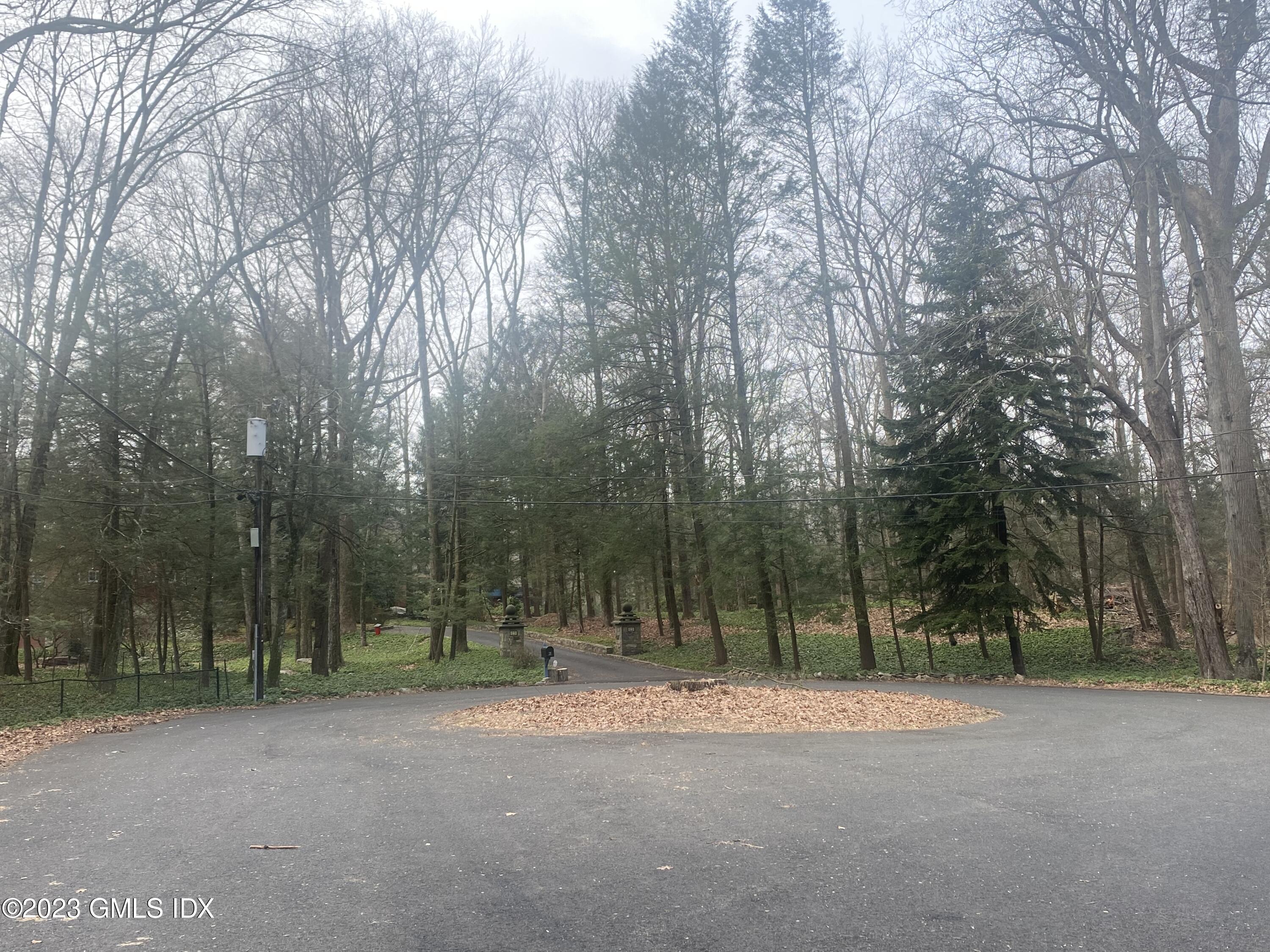 21 Hycliff Road Greenwich, CT 06831 - Photo 13 of 13 a view of road with trees