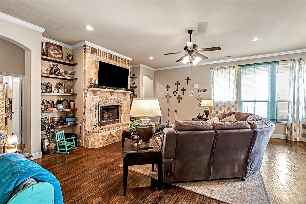 3206 Meadow Ridge Drive Midlothian, TX 76065 - Photo 16 of 37 a living room with furniture fireplace and flat screen tv