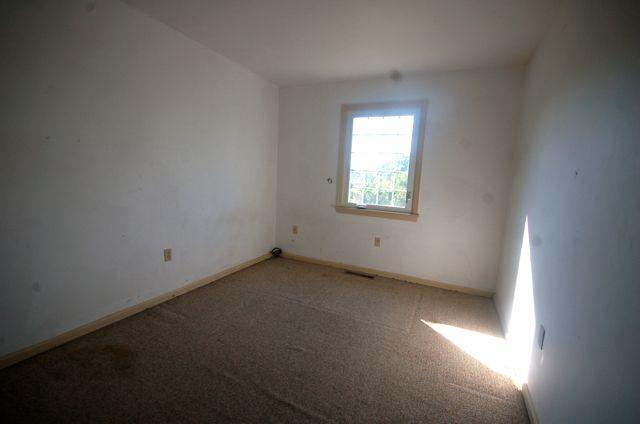 2308 Ranch Road Northwest Roanoke, VA 24017 - Photo 16 of 23 an empty room with a window
