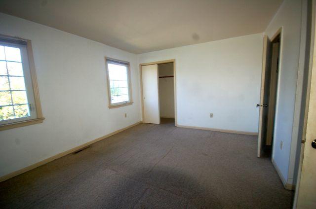 2308 Ranch Road Northwest Roanoke, VA 24017 - Photo 22 of 23 an empty room with windows