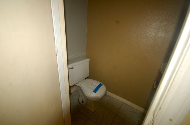 2308 Ranch Road Northwest Roanoke, VA 24017 - Photo 7 of 23 a bathroom with a toilet