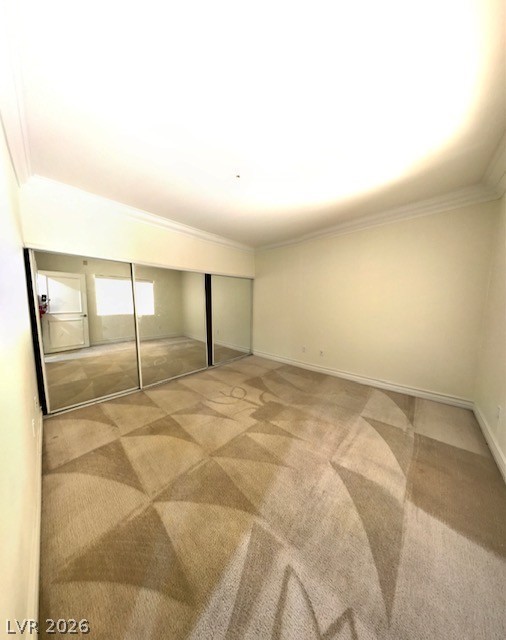 270 East Flamingo Road, Unit 336 Las Vegas, NV 89169 - Photo 5 of 11 This bedroom offers ample space with practical mirror closet doors.