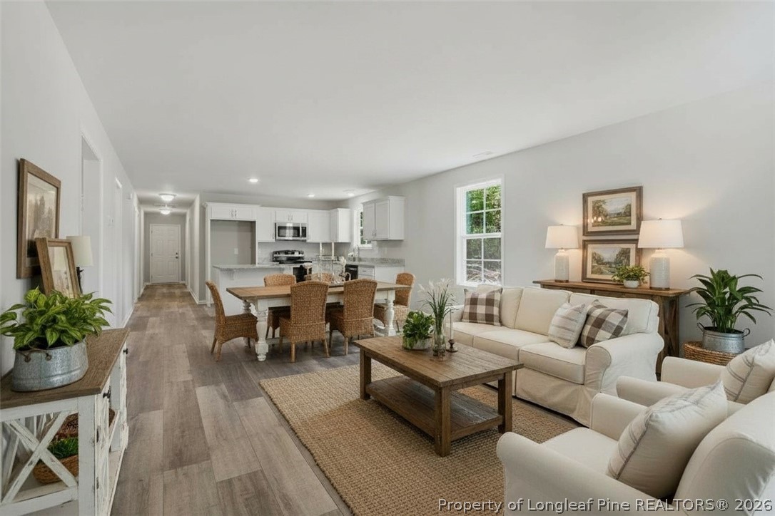 221 South 5th Street Spring Lake, NC 28390 - Photo 6 of 49 Beautifully staged living and dining area
