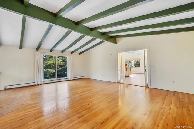 a view of a room with windows