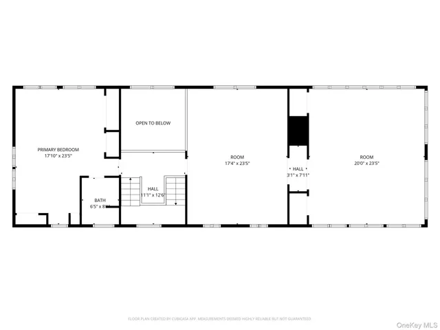 a view of a yard with wooden fence