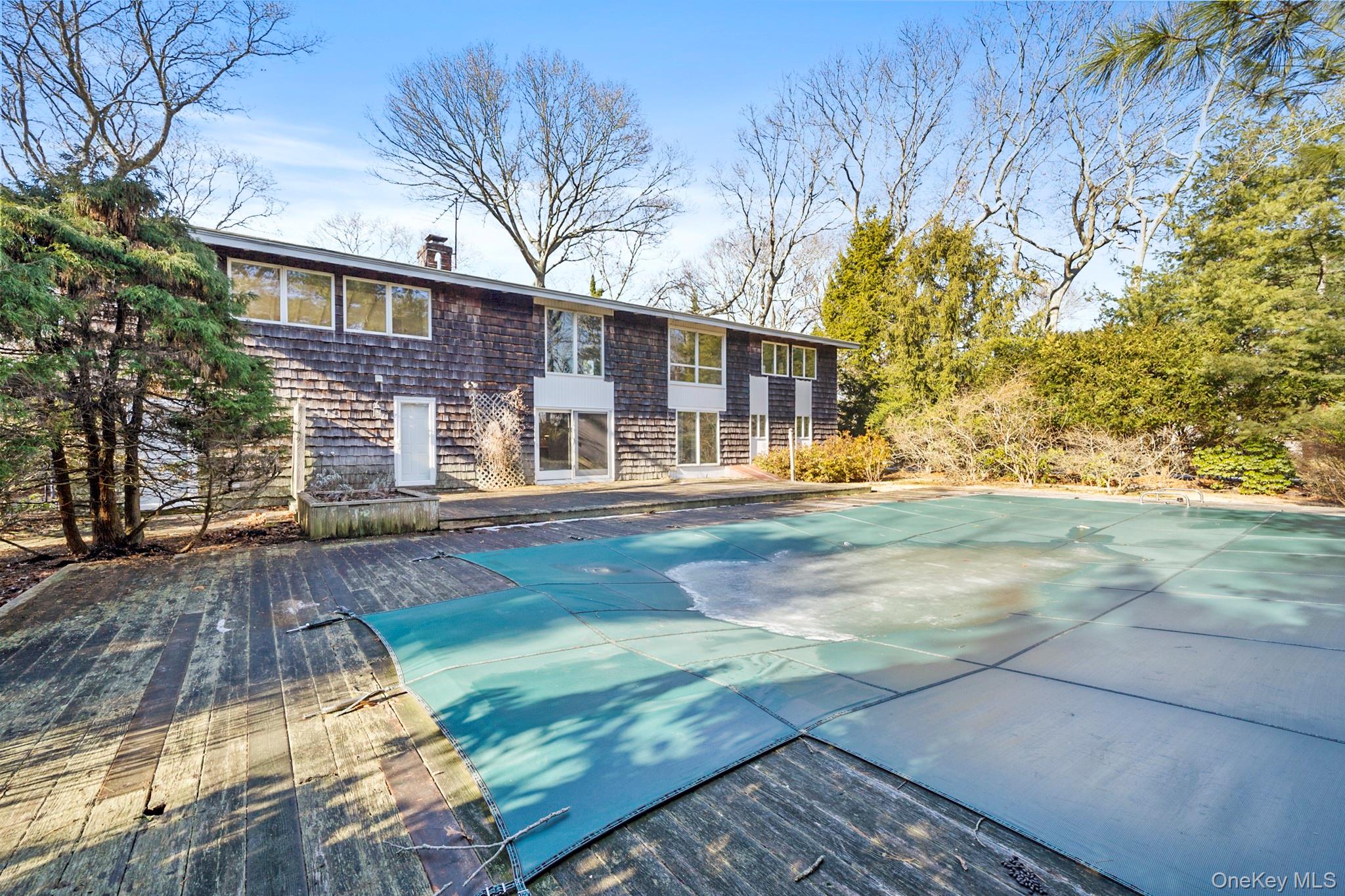149 Munsell Road East Patchogue, NY 11772 - Photo 24 of 29 a view of a house with a yard