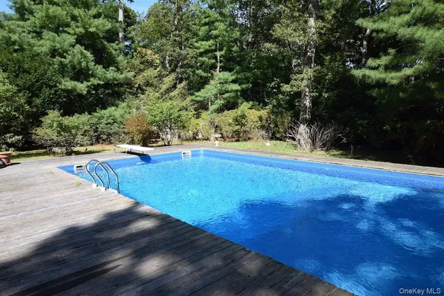 a view of a swimming pool with an outdoor space