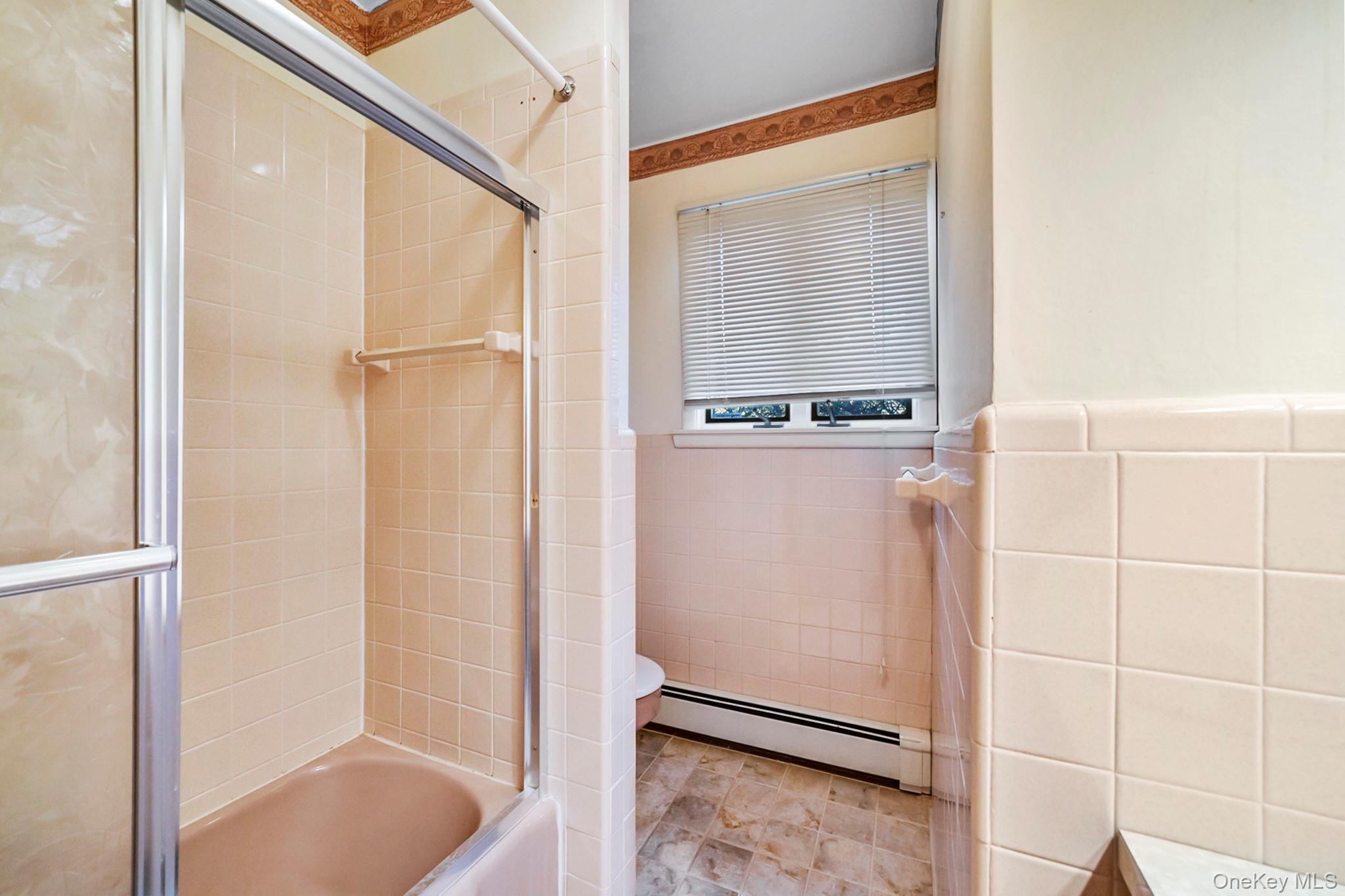 149 Munsell Road East Patchogue, NY 11772 - Photo 10 of 29 a bathroom with a shower