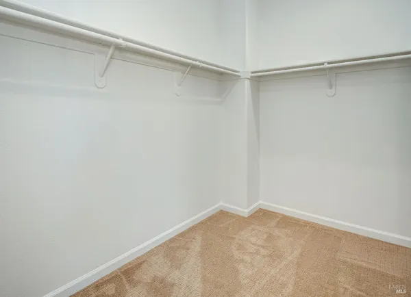 a view of a room with shelf on the wall