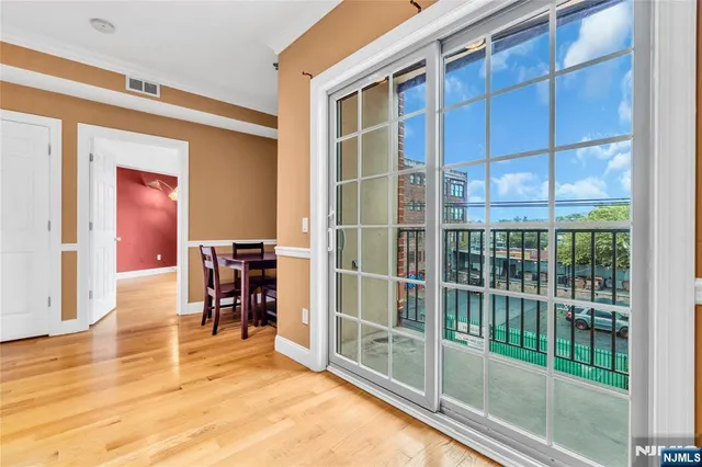a view of livingroom with furniture and dining room