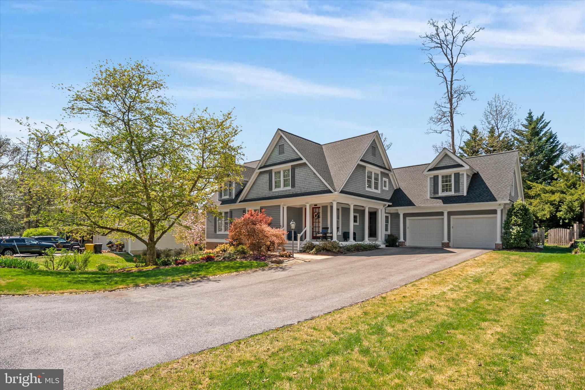 14 Severn River Road Severna Park, MD 21146 - Photo 11 of 73 a front view of a house with a yard and garage