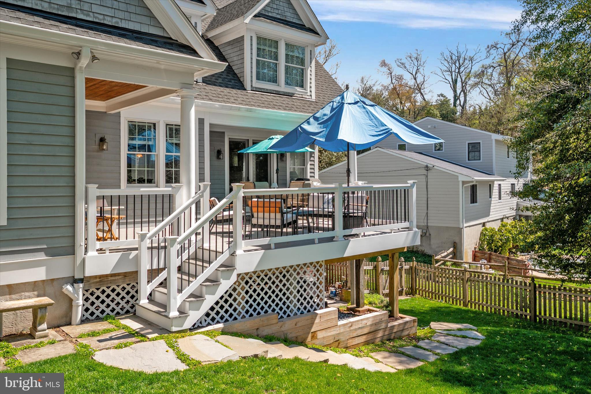 14 Severn River Road Severna Park, MD 21146 - Photo 17 of 73 a front view of a house with a yard table and chairs