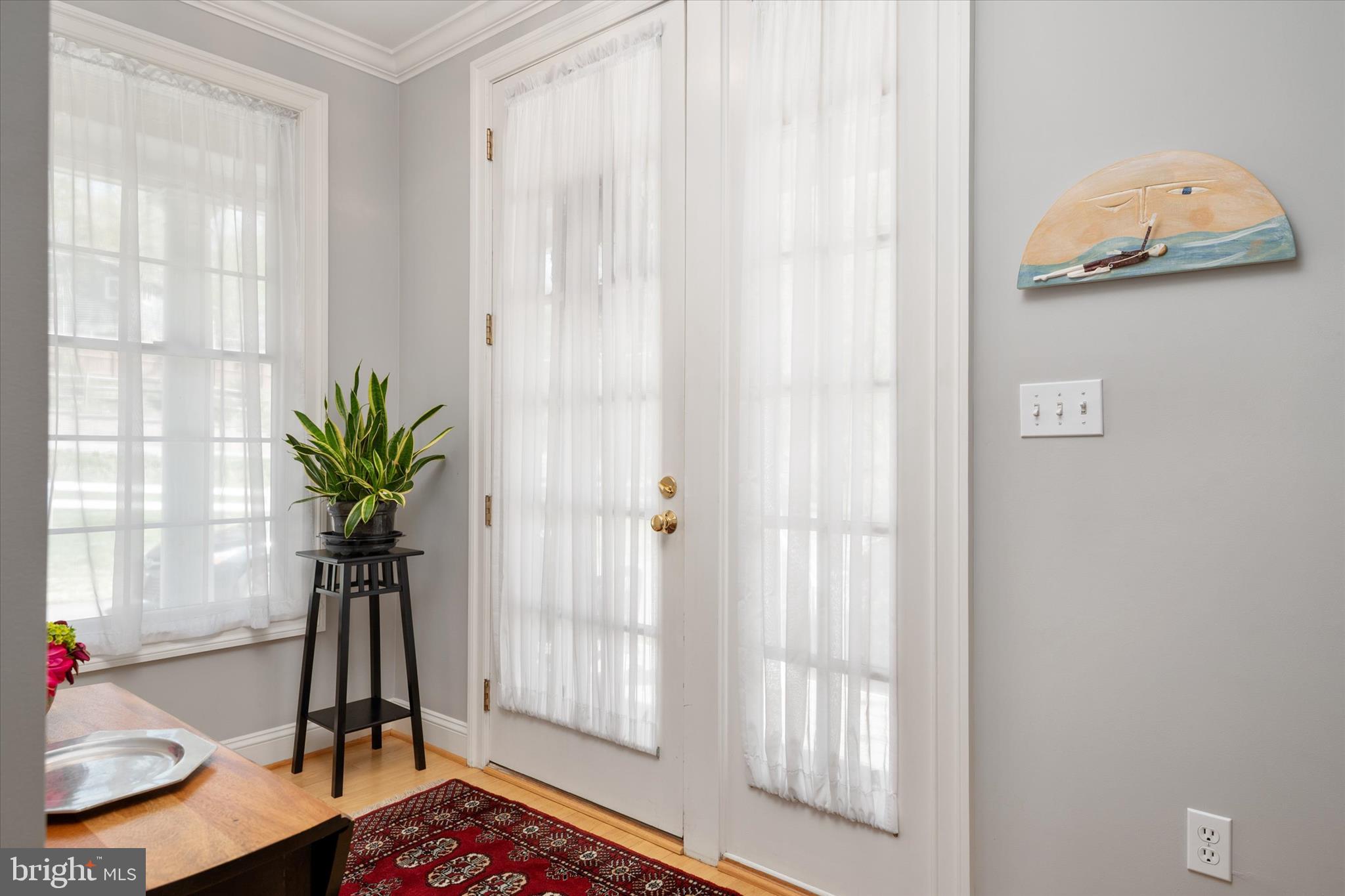 14 Severn River Road Severna Park, MD 21146 - Photo 21 of 73 a view of a potted plant on a table and a couch