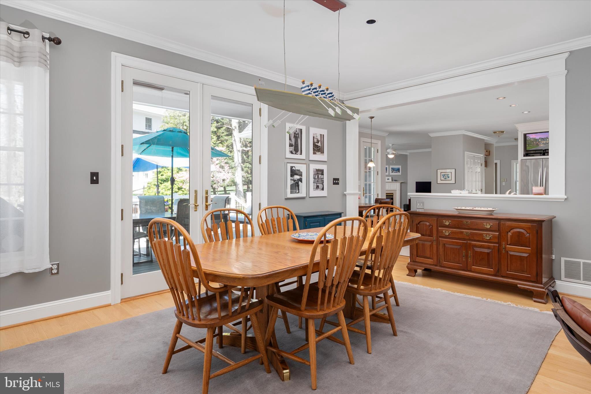 14 Severn River Road Severna Park, MD 21146 - Photo 26 of 73 a dining room with furniture a chandelier and window