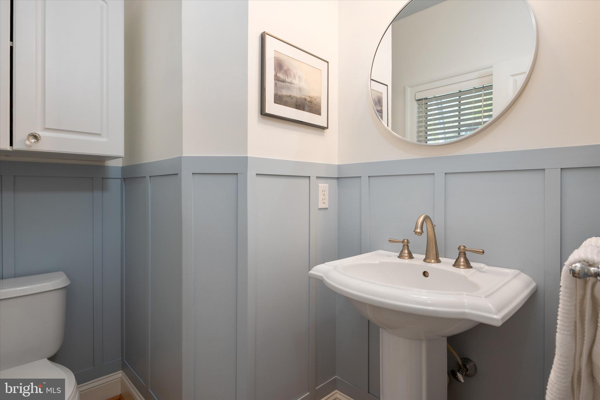 14 Severn River Road Severna Park, MD 21146 - Photo 35 of 73 a bathroom with a sink and a toilet