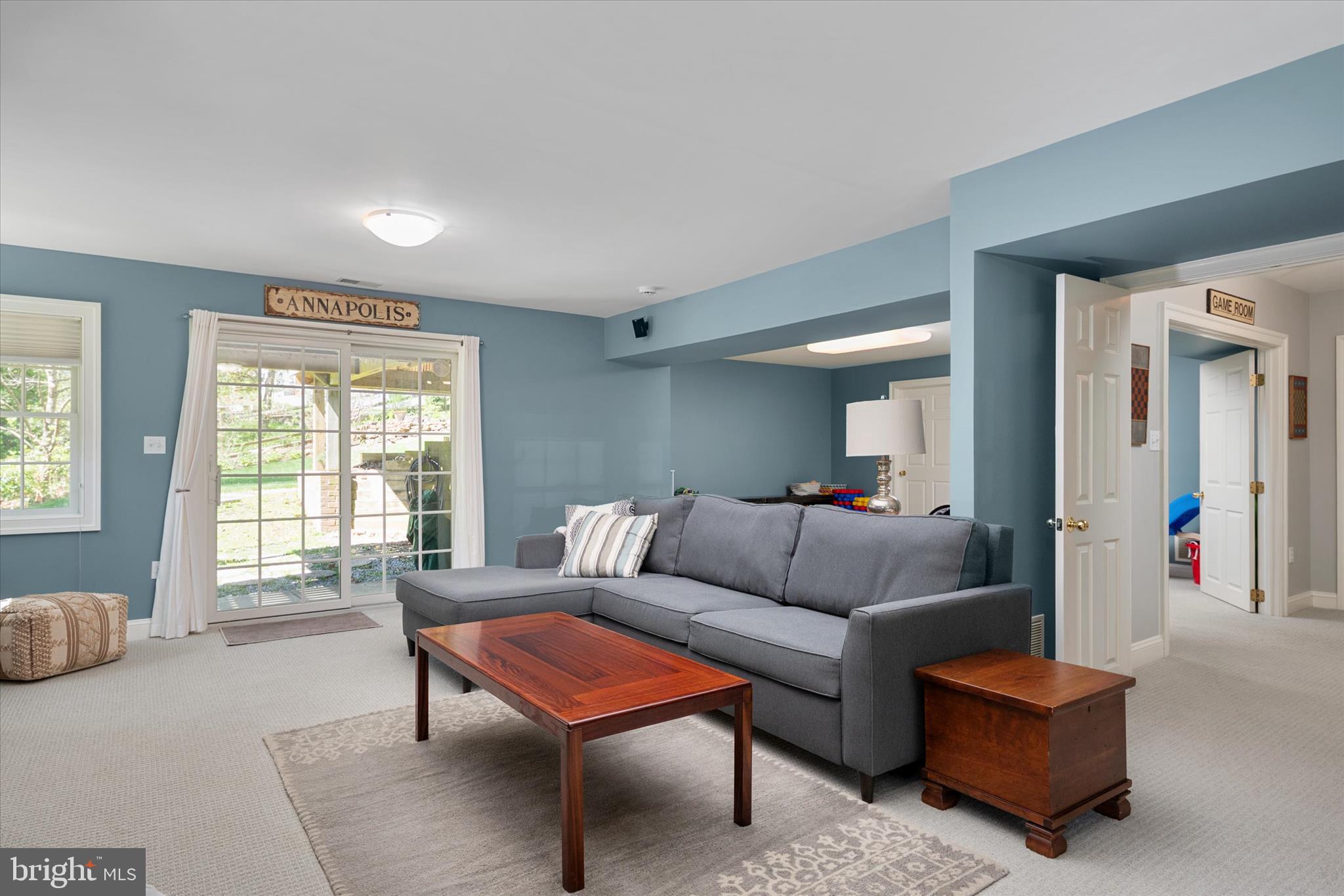14 Severn River Road Severna Park, MD 21146 - Photo 50 of 73 a living room with furniture and a window