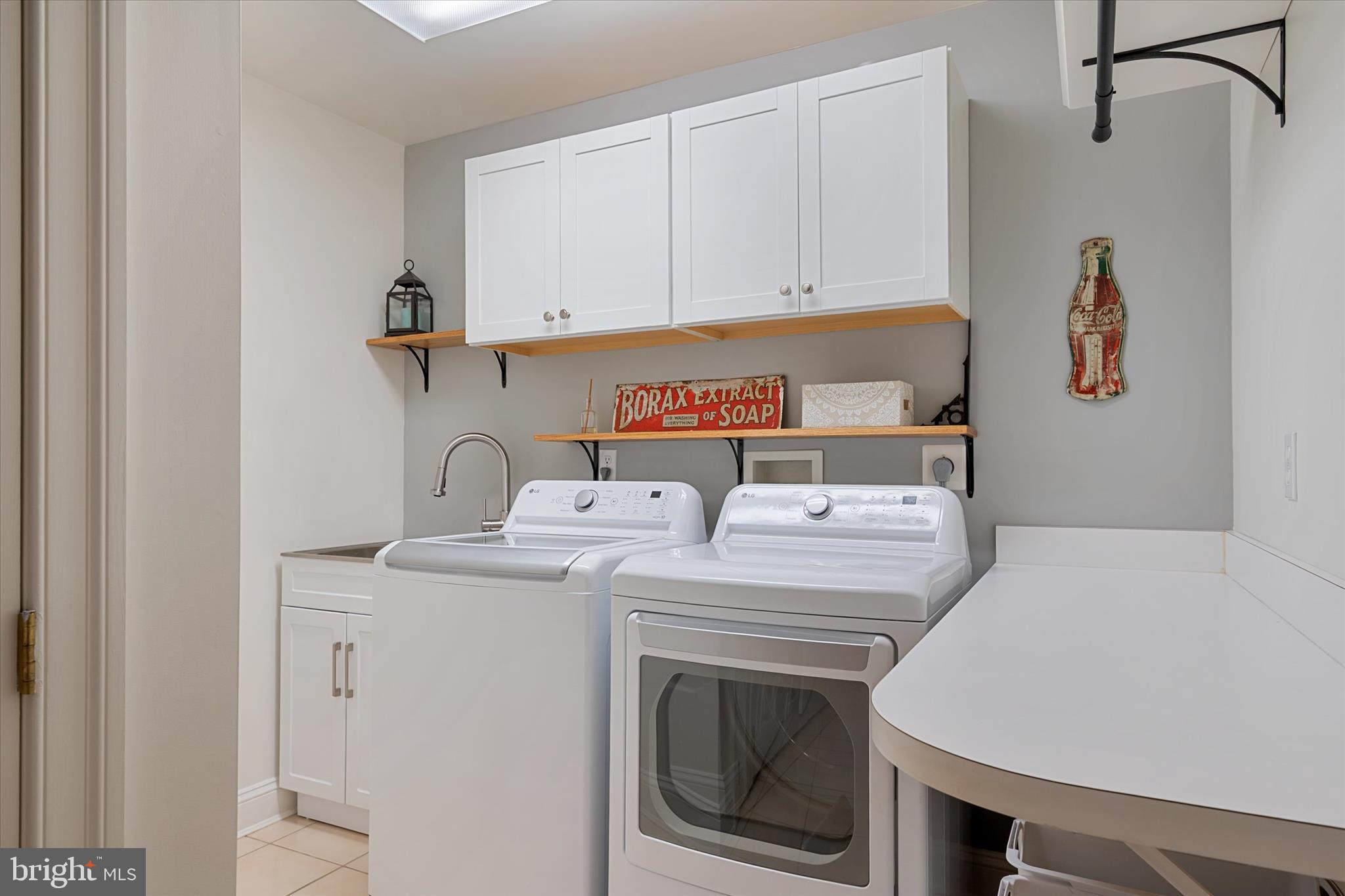 14 Severn River Road Severna Park, MD 21146 - Photo 53 of 73 a utility room with dryer and washer