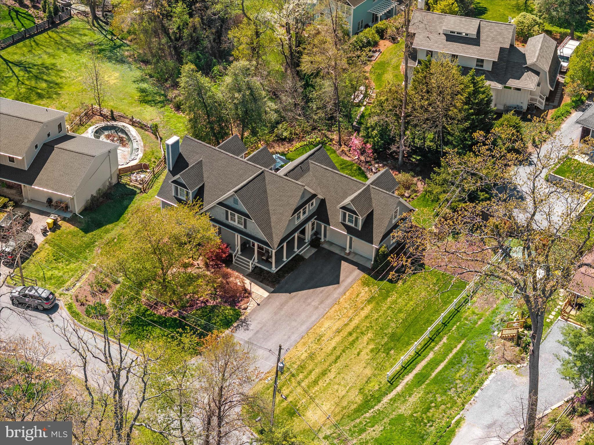 14 Severn River Road Severna Park, MD 21146 - Photo 6 of 73 an aerial view of a house with a swimming pool and outdoor seating