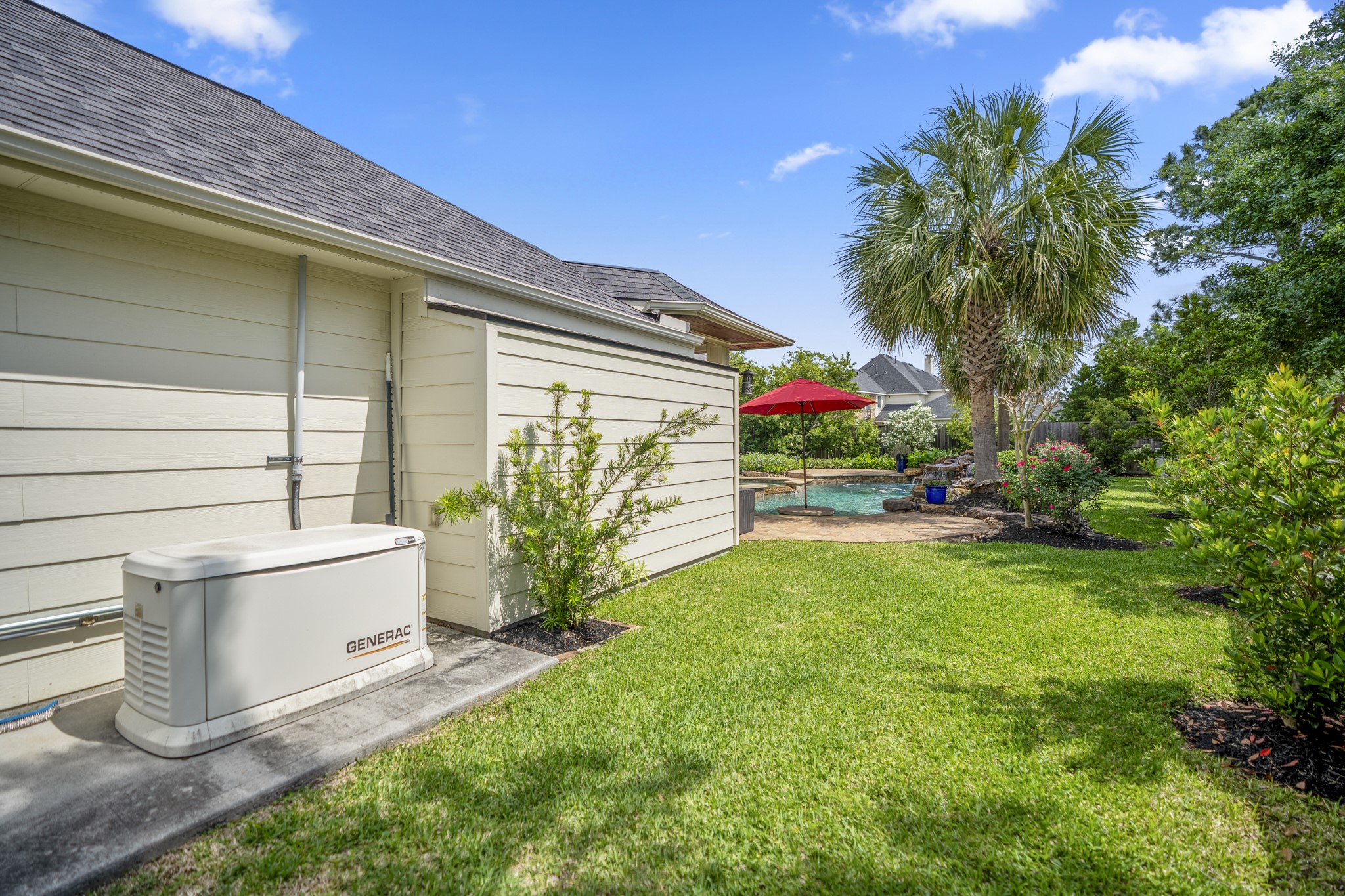 9707 Blue Cruls Way Spring, TX 77379 - Photo 47 of 50 a house view with a garden space
