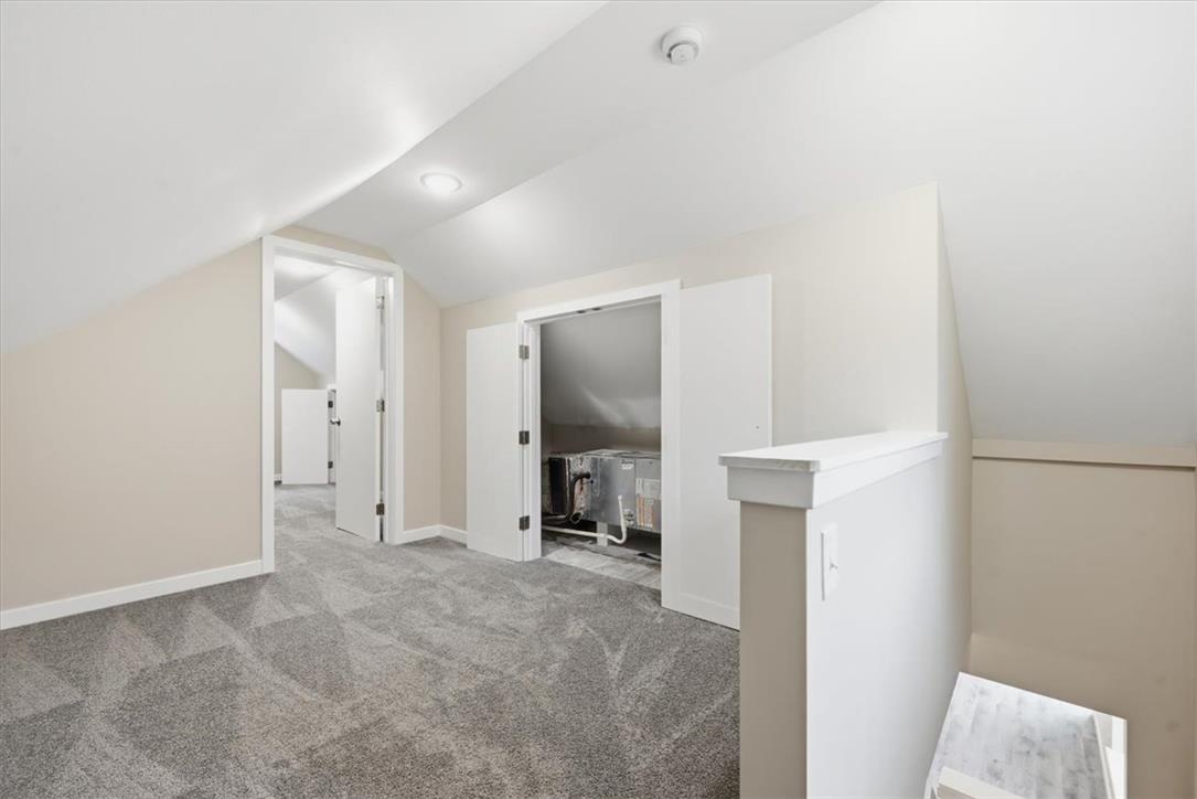 5641 North Coplay Road Whitehall, PA 18052 - Photo 40 of 68 An adaptable attic space featuring soft carpeting and a clear pathway.