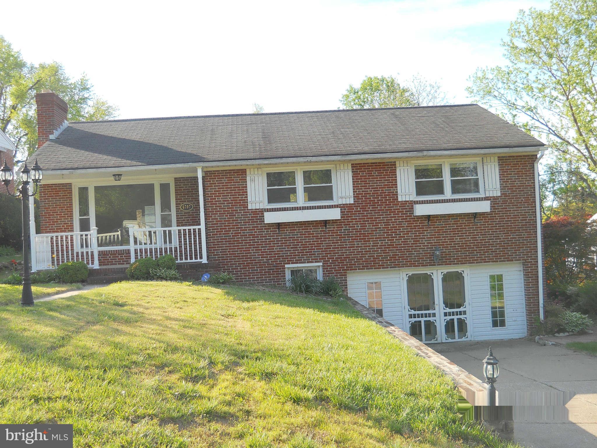 6707 Tweedbrook Road Baltimore, MD 21239 - Photo 1 of 19 a house view with a outdoor space
