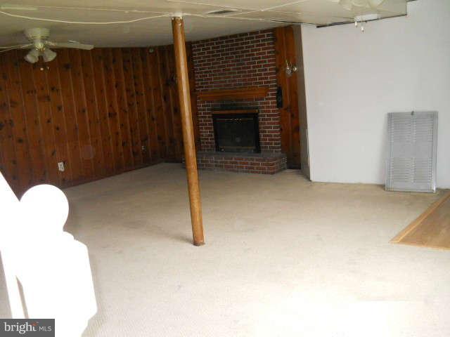 6707 Tweedbrook Road Baltimore, MD 21239 - Photo 14 of 19 a view of an empty room with a window