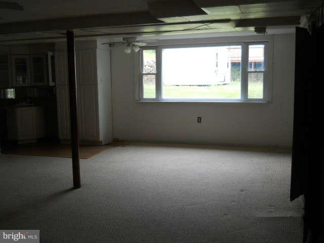 6707 Tweedbrook Road Baltimore, MD 21239 - Photo 15 of 19 a view of an empty room with a window