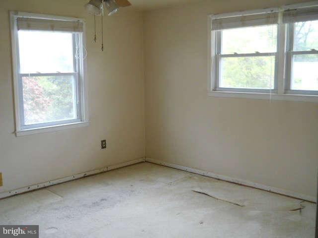 6707 Tweedbrook Road Baltimore, MD 21239 - Photo 9 of 19 an empty room with a window