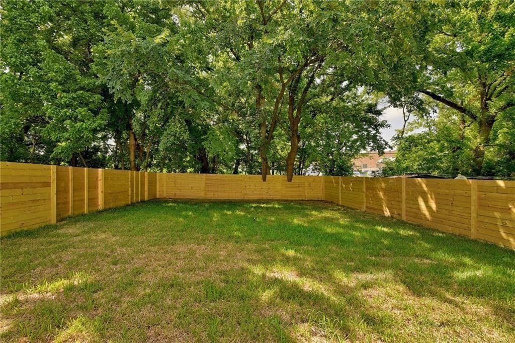 6405 Chesterfield Avenue, Unit A Austin, TX 78752 - Photo 15 of 15 a view of backyard with green space