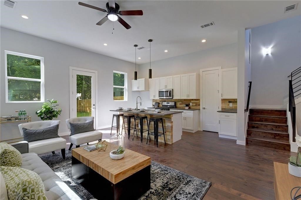 6405 Chesterfield Avenue, Unit A Austin, TX 78752 - Photo 3 of 15 a living room with furniture and wooden floor