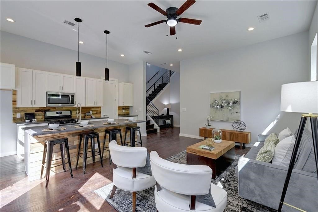 6405 Chesterfield Avenue, Unit A Austin, TX 78752 - Photo 4 of 15 a living room with lots of furniture and kitchen view