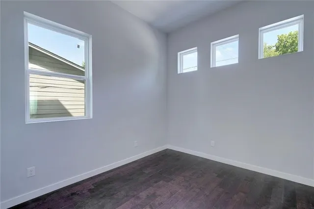 an empty room that has a window