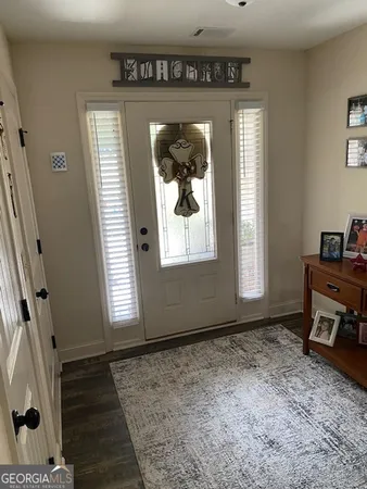 a view of a livingroom with a window
