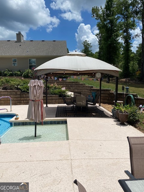 479 High Point Road Milledgeville, GA 31061 - Photo 26 of 27 a backyard view of a house with basket ball court