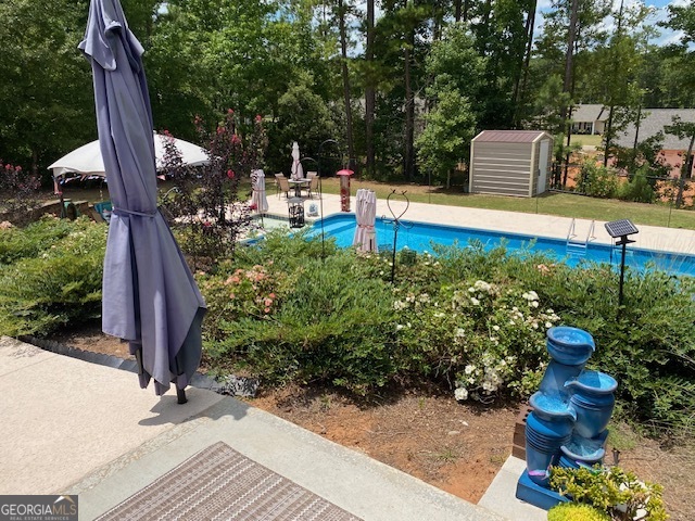 479 High Point Road Milledgeville, GA 31061 - Photo 27 of 27 a view of a garden with sitting area