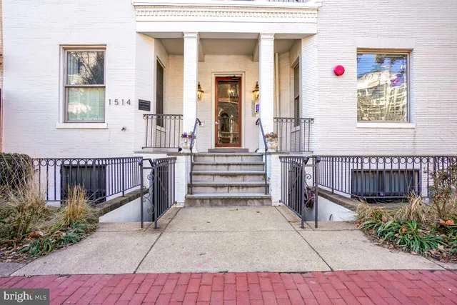 front view of a house with a small yard