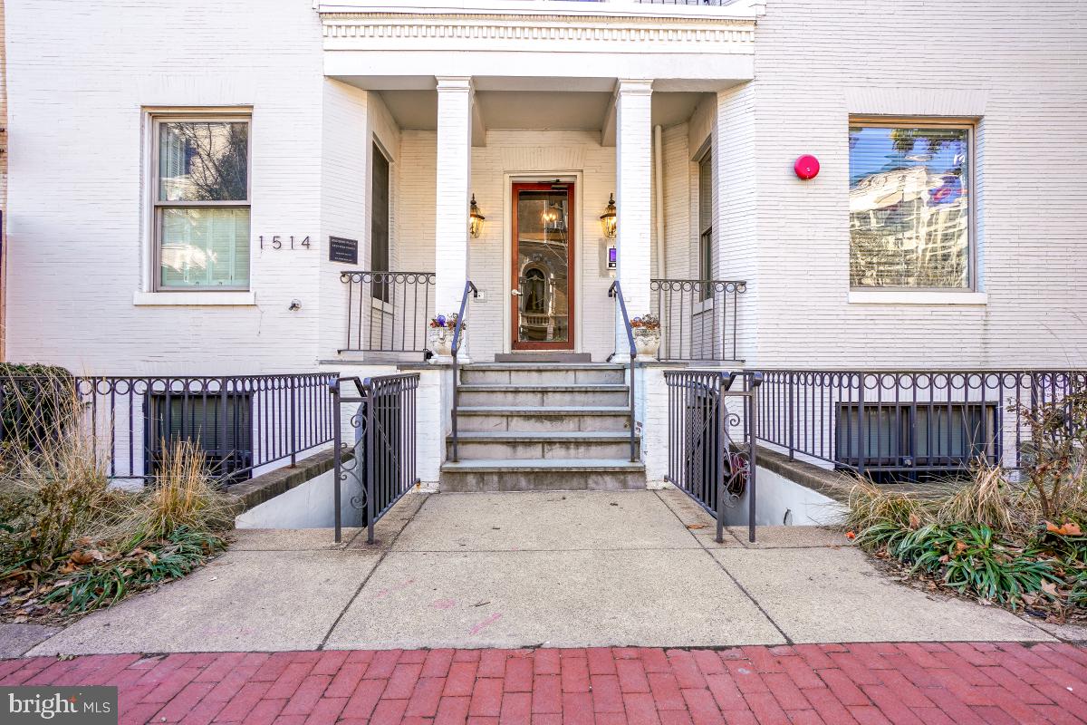1514 21st Street Northwest, Unit 1 Washington, DC 20036 - Photo 2 of 29 front view of a house with a small yard