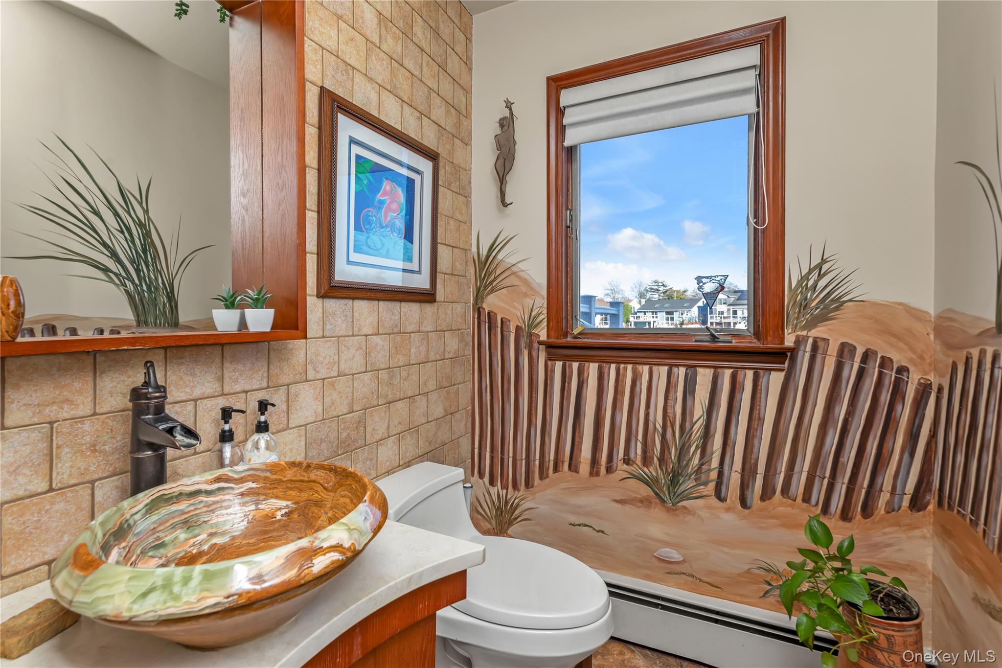 3522 Frederick Street Oceanside, NY 11572 - Photo 11 of 23 Half bath with vanity and baseboard heating