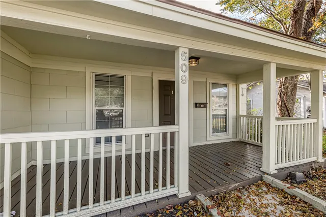 a view of a house with a porch