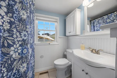 a bathroom with a sink and a toilet