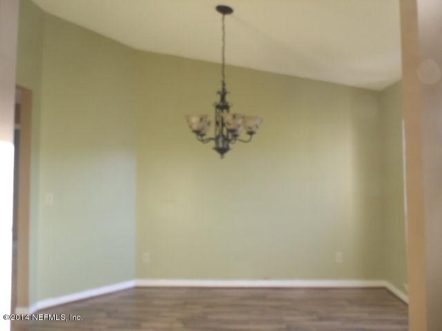 7893 Springtime Lane Jacksonville, FL 32221 - Photo 4 of 14 a small space with a chandelier