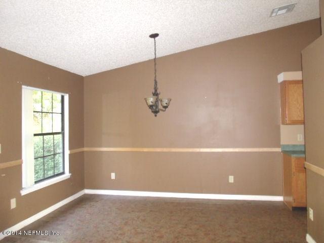 7893 Springtime Lane Jacksonville, FL 32221 - Photo 8 of 14 a view of a room with window