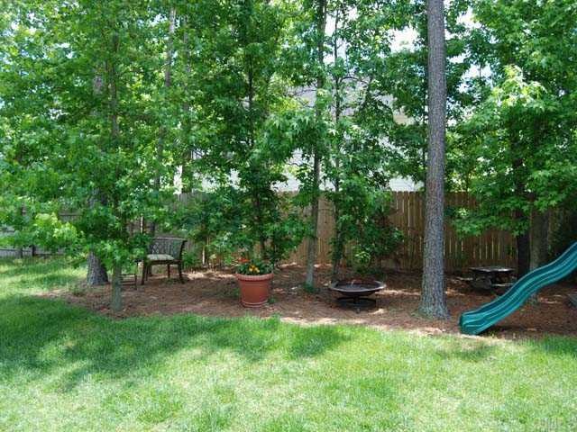 5608 Enoree Lane Raleigh, NC 27616 - Photo 11 of 12 Lovley wooded landscaped yard