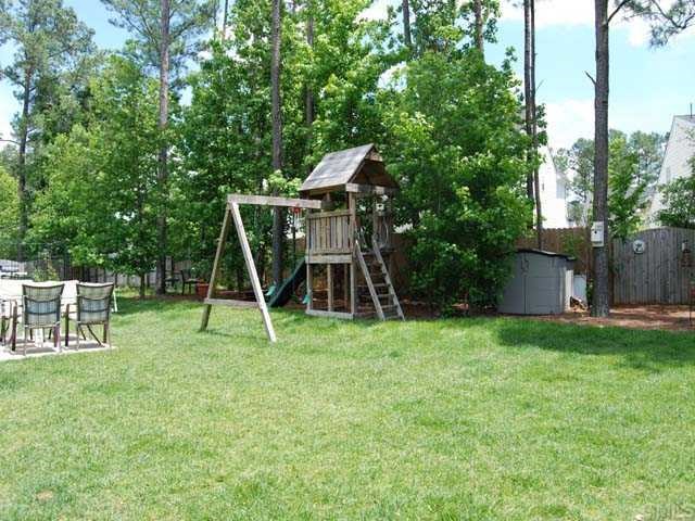 5608 Enoree Lane Raleigh, NC 27616 - Photo 12 of 12 lovely wooded landscaped backyard